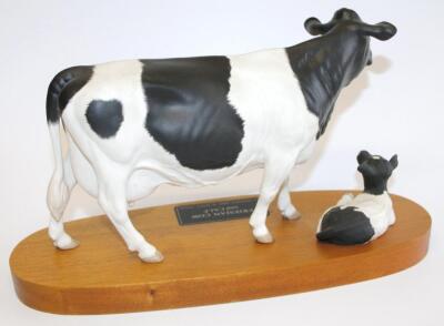 A Beswick Friesian cow and calf connoisseur model - 2