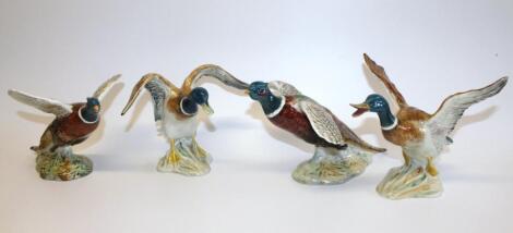 A pair of Beswick flying pheasants