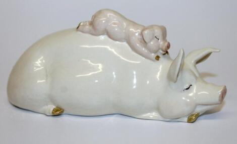 A Beswick pig and piglet ornament