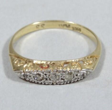 A ladies 18ct gold and diamond hoop ring