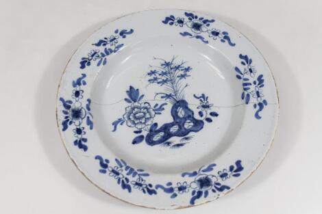 An 18thC Delft blue and white charger