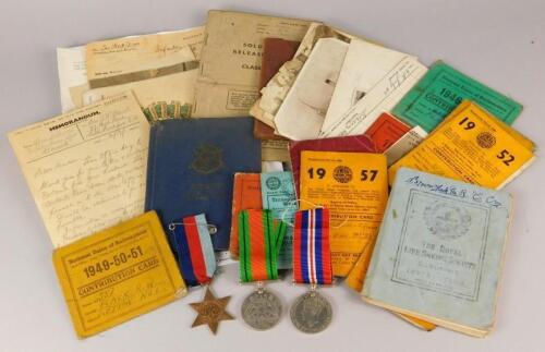 A collection of WWII medals and ephemera relating to a Private R W Flack