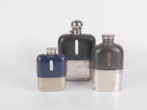 Three cut glass hip flasks