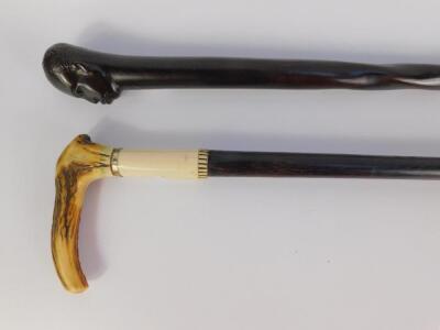 A bone and hardwood walking stick with a horn handle