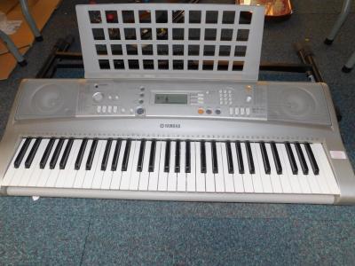 A Yamaha E303 electric keyboard