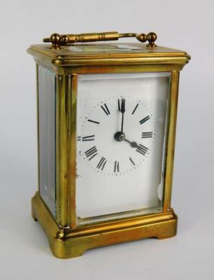 A brass cased carriage clock