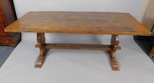 An oak four plank refectory dining table