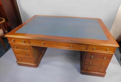 A Victorian mahogany partner's desk