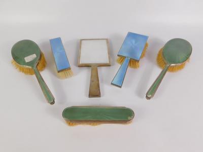 An Edward VIII silver and turquoise guilloche enamel three piece dressing table set