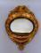 A 19thC gilt wood and gesso circular wall mirror