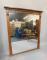 A Victorian mahogany and gilt wood Neo-Classical overmantel mirror