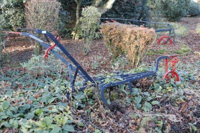 A 19thC wrought iron horse drawn plough.