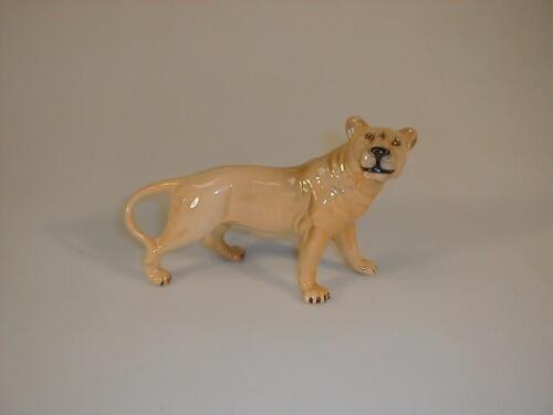 A Beswick figure of a lioness