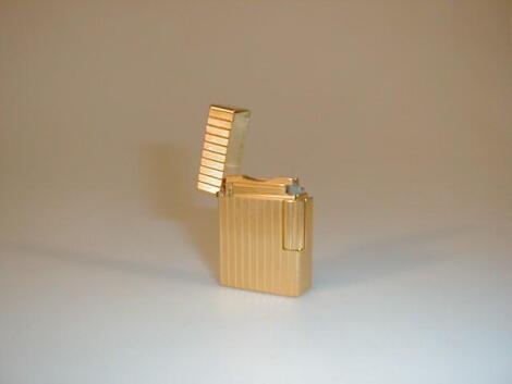 A DuPont gold plated cigarette lighter