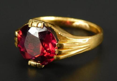 A ruby set dress ring