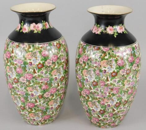 A pair of Crown Ducal Staffordshire chintz printed vases