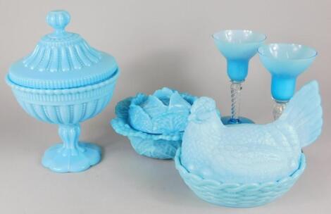 A collection of turquoise moulded glass