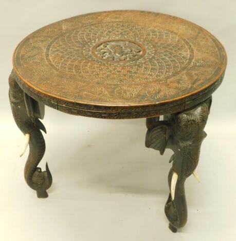 An oriental hardwood table