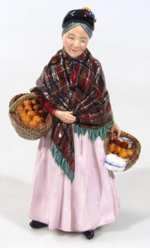 A Royal Doulton figure The Orange Lady