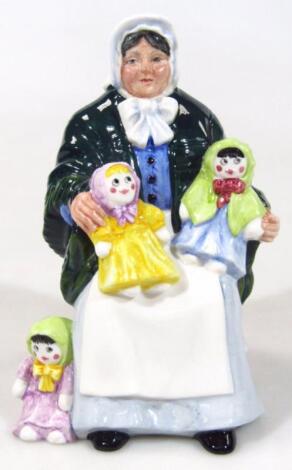 A Royal Doulton figure The Rag Doll Seller