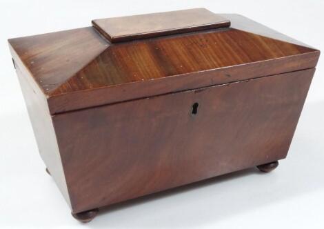 A mid 19thC mahogany sarcophagus shaped tea caddy