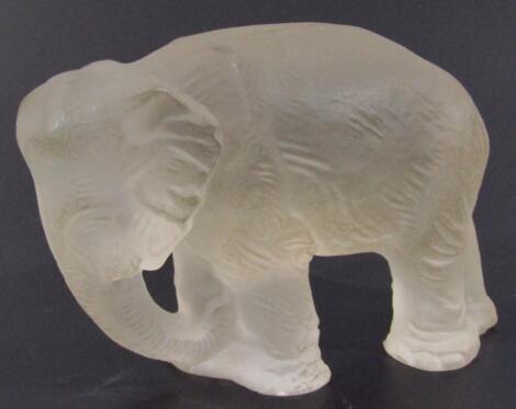 A frosted glass figure of an elephant.