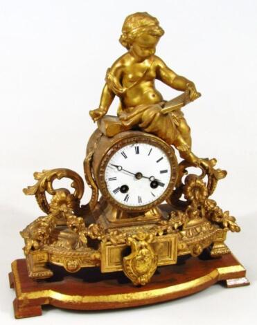 A late 19thC gilt metal mantel clock