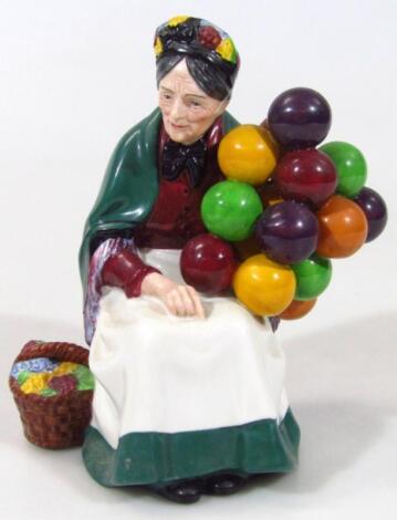 A Royal Doulton figure The Old Balloon Seller