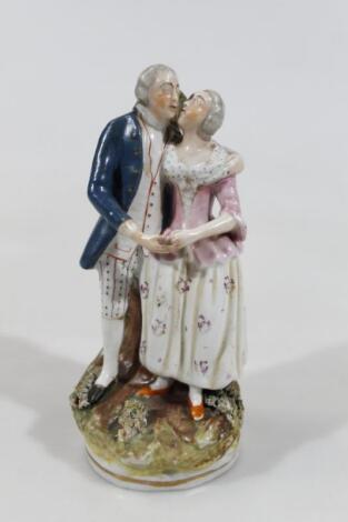 An early 20thC porcelain figure group