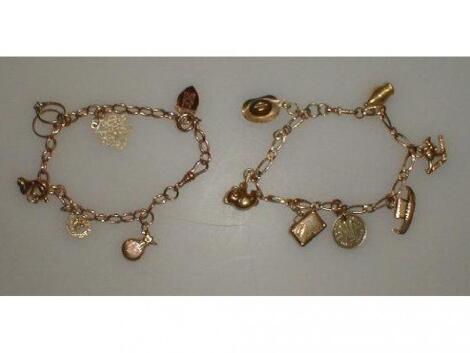 Two charm bracelets, 9ct, various marks