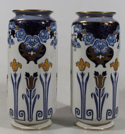 A pair of early 20thC Crown pottery Doris pattern vases