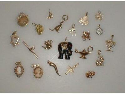 A quantity of loose charms and pendants mostly 9ct