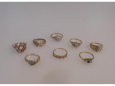 Eight 9ct gold dress rings