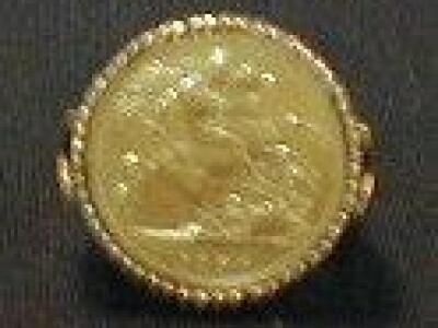 A Victorian £ sovereign 1900 set in a 9ct gold ring mount