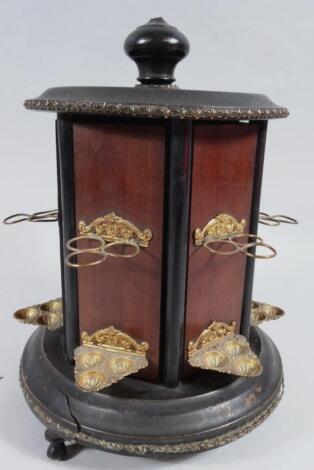 An early 20thC polished mahogany and ebonised cigar stand