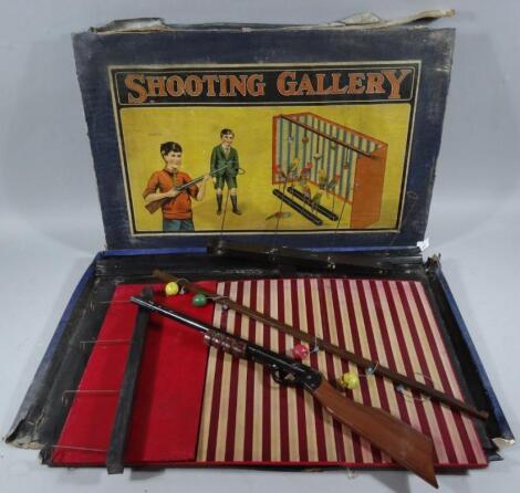 An early 20thC child's shooting gallery game