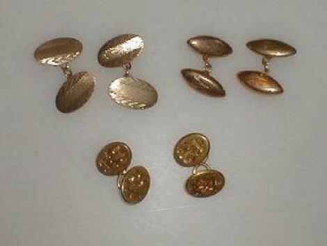 Three sets of gold cuff links