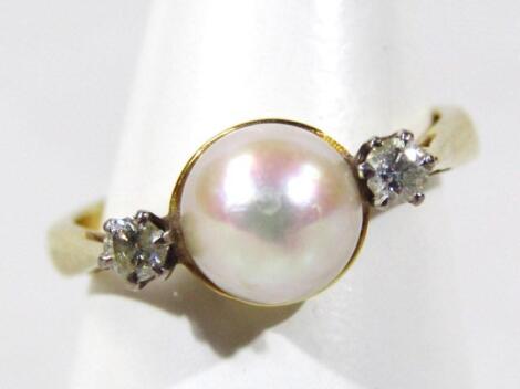 An 18ct gold cultured pearl and diamond dress ring