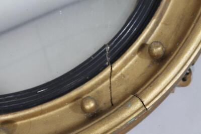 A 19thC gilt wood porthole mirror - 2