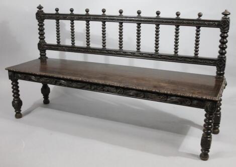 An early 19thC oak bench