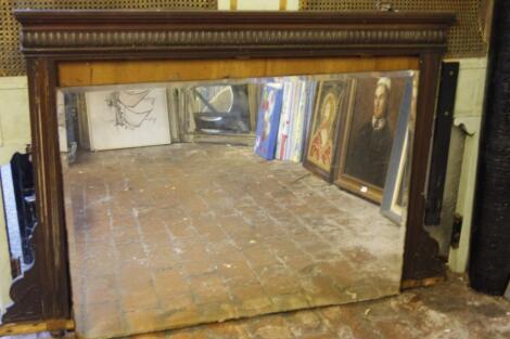 A 19thC carved walnut over mantel mirror