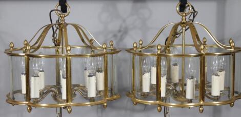 A pair of brass hanging lanterns.