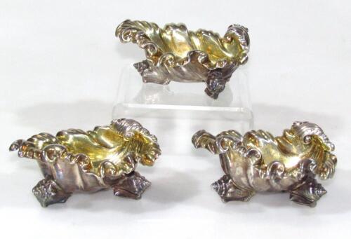 A pair of William IV crested silver salts