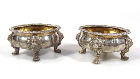 A pair of George II crested silver salts