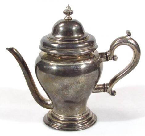 A Victorian silver coffee pot