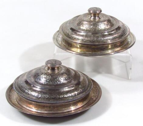 A matched pair of principally mid 19thC Continental food warmers with Victorian silver removable ban