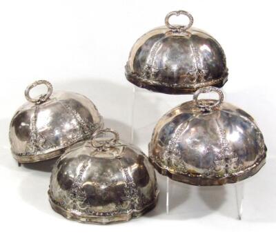 A set of four Victorian silver food covers