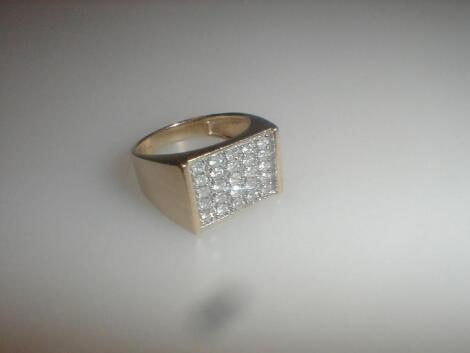 A gent's signet ring with rectangular head set with tiny diamonds