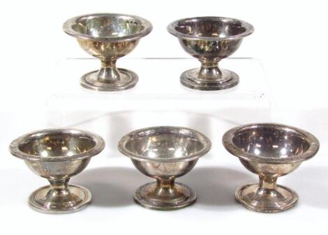 A set of five George III two sized open salts