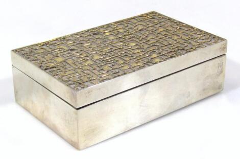 An Elizabeth II silver cigarette box